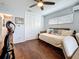 Cozy bedroom with wood floors, natural light, and closet space at 1120 81St S St, St Petersburg, FL 33707