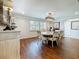 Elegant dining room with wood floors and plantation shutters at 1120 81St S St, St Petersburg, FL 33707