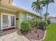 Inviting home exterior showcasing decorative doors and well-maintained landscaping elements at 1120 81St S St, St Petersburg, FL 33707
