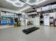 Organized garage space with overhead storage racks and epoxy floors at 1120 81St S St, St Petersburg, FL 33707