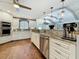 Open kitchen with granite countertops, stainless steel appliances, and a breakfast bar at 1120 81St S St, St Petersburg, FL 33707