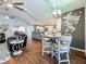 Open floor plan with view from living room to kitchen and breakfast bar at 1120 81St S St, St Petersburg, FL 33707