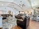 Spacious living room with vaulted ceilings and open floor plan to the kitchen and dining area at 1120 81St S St, St Petersburg, FL 33707