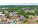 Expansive aerial view of a residential area featuring homes with pools and lush greenery at 2204 Krista Ln, Brandon, FL 33511