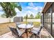 Cozy backyard patio with seating, tiki torch, and storage shed views at 2204 Krista Ln, Brandon, FL 33511