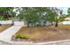 Charming home with stone accents, a two-car garage, and mature landscaping at 2204 Krista Ln, Brandon, FL 33511