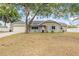 Charming single-story home with stone accents and a well-manicured lawn at 2204 Krista Ln, Brandon, FL 33511