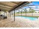 Relaxing screened-in pool with brick pavers and storage shed at 2204 Krista Ln, Brandon, FL 33511