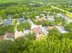 Neighborhood aerial view with mature trees, landscaped yards, and well-maintained homes at 18941 Twinberry Dr, Tampa, FL 33647