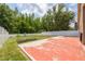 Large backyard with a well-maintained lawn and a white privacy fence, providing seclusion at 18941 Twinberry Dr, Tampa, FL 33647