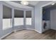 Bright dining area features a bay window and is located next to the laundry room at 18941 Twinberry Dr, Tampa, FL 33647