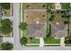 Aerial view of the property showcasing the home, backyard, and surrounding neighborhood at 13365 Chesapeake Pl, Spring Hill, FL 34609