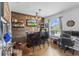 Beautiful bar area with custom wood and countertop, with additional seating and shelving at 13365 Chesapeake Pl, Spring Hill, FL 34609