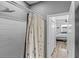 Bathroom with shower and bedroom view at 13365 Chesapeake Pl, Spring Hill, FL 34609