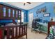 Stylish bedroom with a bunk bed, gaming setup, and modern decor at 13365 Chesapeake Pl, Spring Hill, FL 34609