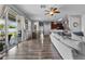 Open-concept living room seamlessly connects to the kitchen and dining area at 13365 Chesapeake Pl, Spring Hill, FL 34609