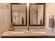 Elegant bathroom featuring a double sink vanity, granite countertops, and neutral color palette at 18101 Boy Scout Rd, Odessa, FL 33556