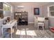 Bright studio space with natural light, custom shelving and modern décor at 18101 Boy Scout Rd, Odessa, FL 33556