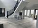 Inviting entryway with high ceilings and a staircase to the second floor at 2518 Sunset Ln, Lutz, FL 33559