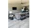 Spacious living room with modern furnishings and large tv at 2518 Sunset Ln, Lutz, FL 33559