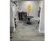 Bright room with a study area featuring a round table, chairs, and wall decorations for an engaging learning environment at 2518 Sunset Ln, Lutz, FL 33559