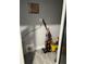 A utility closet provides the perfect space for cleaning supplies at 2518 Sunset Ln, Lutz, FL 33559