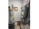 This utility room features a water heater and a modern HVAC system at 2518 Sunset Ln, Lutz, FL 33559