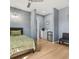Modern bedroom with kitchenette, seating, and bright natural light at 5479 S Biscayne Dr, North Port, FL 34287