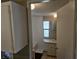 Functional bathroom with a vanity, mirror, and a combination shower and bathtub at 9202 Teak St, New Port Richey, FL 34654