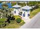 Entrance to the Triple Creek community featuring manicured landscaping and stylish signage at 13201 Orca Sound Dr, Riverview, FL 33579