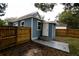 Charming home featuring a fenced yard and a cozy entrance, perfect for outdoor enjoyment at 5117 16Th Ave, Gulfport, FL 33707