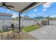 Backyard features a covered patio, seating, and shed at 4444 5Th S Ave, St Petersburg, FL 33711