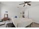 Bedroom featuring a ceiling fan, neutral decor, and natural light at 4444 5Th S Ave, St Petersburg, FL 33711