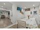 Large dining space open to living area with white door at 4444 5Th S Ave, St Petersburg, FL 33711