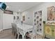 Bright dining room with seating for eight and decor shelving at 4444 5Th S Ave, St Petersburg, FL 33711