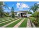 Charming home exterior with professionally landscaped front yard at 4444 5Th S Ave, St Petersburg, FL 33711