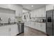 Modern kitchen featuring stainless steel appliances and white cabinetry at 4444 5Th S Ave, St Petersburg, FL 33711