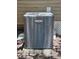 Exterior shot of the gray Lennox AC unit at 917 E 15Th Ave, Tampa, FL 33605