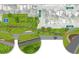 Community aerial view showcasing a park with dog areas, green spaces and neighborhood streets at 917 E 15Th Ave, Tampa, FL 33605