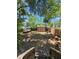 Spacious backyard with a shed, vintage trailer and lots of foliage at 917 E 15Th Ave, Tampa, FL 33605