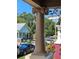 Close up of an ornate column supporting the porch roof showing classical architectural details and design elements at 917 E 15Th Ave, Tampa, FL 33605