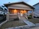 Charming single Gathering home featuring craftsman details and a welcoming covered porch at 917 E 15Th Ave, Tampa, FL 33605