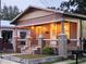 Charming single Gathering home featuring craftsman details and a welcoming covered porch with brick pillars at 917 E 15Th Ave, Tampa, FL 33605