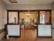 Spacious living room with hardwood floors and detailed columns at 917 E 15Th Ave, Tampa, FL 33605