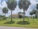 Large backyard enclosed by a chain-link fence, providing a safe space for recreation and relaxation at 4611 Herman Cir, Port Charlotte, FL 33948