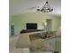 Open kitchen features granite countertops, stainless steel sink, and ample cabinet space at 4611 Herman Cir, Port Charlotte, FL 33948