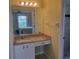 Bathroom featuring a granite countertop vanity, bright lighting, and a walk-in shower at 4611 Herman Cir, Port Charlotte, FL 33948