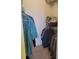 Practical walk-in closet with shelves, hanging space, and plenty of storage for clothing at 4611 Herman Cir, Port Charlotte, FL 33948