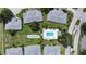 Aerial view of community featuring residences and a sparkling swimming pool at 6948 W Country Club N Dr, Sarasota, FL 34243