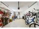 Spacious garage with ample storage, laundry area and space for bikes and other equipment at 6948 W Country Club N Dr, Sarasota, FL 34243